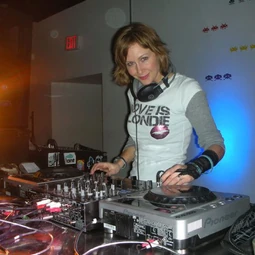 Stacie DJing under the name “DJ Mistylicious”