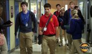 Drew Walking Down The Halls Of Degrassi In His Degrassi Uniform