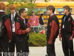 Dallas and Luke talking outside.