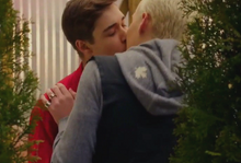 Tristan and Miles kissing in the Greenhouse.