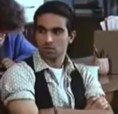 Nick with his signature ponytail.