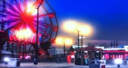 Der Rummelplatz bei Nacht ist hell erleuchtet