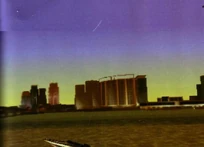 Blick auf das große Hotel auf der Ostinsel, unten noch ein Boot (möglicherweise ein Jetmax)