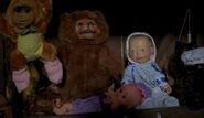 Baby Oopsie Daisy alongside Grizzly Teddy in Puppet Master vs. Demonic Toys