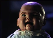 Baby Oopsie Daisy in Dollman vs. Demonic Toys