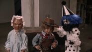 Baby Oopsie alongside Cowboy Roy and Frownie Clownie in Baby Oopsie 3: Burn Baby Burn!