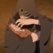 Tobi hält Naruto als Geisel