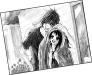 Teru and Kurosaki under the rain.