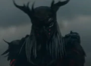 Njohrr, triunfante, antes de asesinar a Kwei.