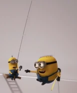 Carl laughing at Tim, while hanging on Fishing Rod