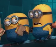 Doug trying to get a sandwich from Alexander