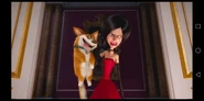 Scarlet holds the Corgi