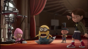 A minion is seemingly cut by a falling ax
