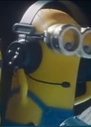 Tall two eyed minion with spiky hair.