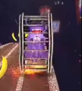 A cage along with purple minions