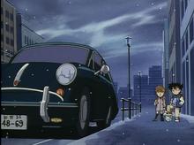 Conan y Haibara ven el Porsche de Gin