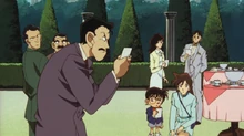 Kogoro is pondering Moriya's quiz.