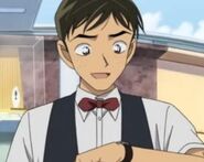 Kid then changes disguises later in Movie 14 as one of their waiters.