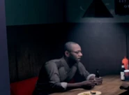 Dennis drinking at Jimmy's Bar with Chris Roberts.