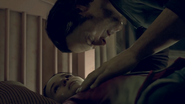 Todd crying over Alice's lifeless body.