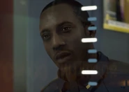 Border guard hesitates, looking at Alice.