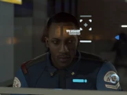 Border guard watches the trio leave after neglecting to scan them.