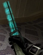 Holding the stun prod.