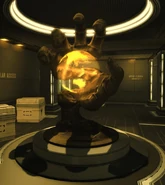 MJ12hand-picusbasement.png (586 KB) A statue of the Majestic 12 logo in the Picus Montreal sub-basement in 2027.
