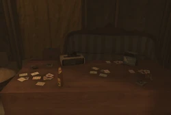 How to play Durak eBook near a table with playing cards