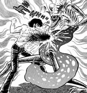 Akira slams his fist into Ghelmer's stomach