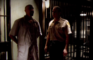Guard removes Norberto from his jail cell