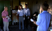 Deb presents the hammer she found