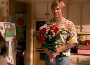 Paul brings flowers for Rita