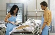 Dexter shows Lila field morgue.jpg (104 KB) Dexter takes Lila inside field morgue