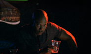 Doakes watches Dexter at the bowling alley