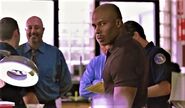 Doakes looks back at Dexter suspiciously