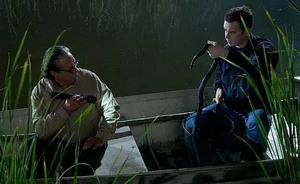 Travis catches a water snake