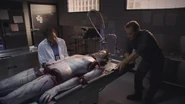 DoomsdayPic2.jpg (33 KB) Dexter ponders the way the body was dismembered