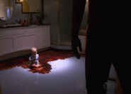 Dexter finds Harrison sitting in blood