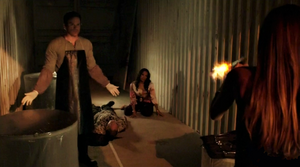 Debra fires her gun at LaGuerta.