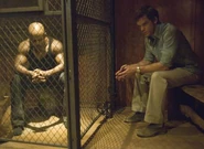 Doakes in a cage