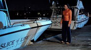 Maria stares at Dexter's boat