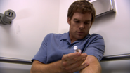 Dexter draws his own blood