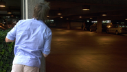 Dexter stalks Arthur in the parking garage