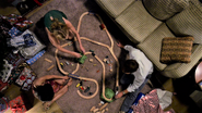 Dexter, Hannah, Jamie set up a toy train set for Harrison