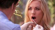 Dexter takes DNA swab from Hannah