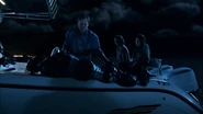Deb and Vogel accompany Dexter as he dumps A.J.'s body