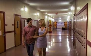 Dexter and Trisha in the hallway