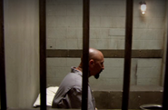 Norberto in jail cell