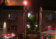 Last view of the apartment building, after Dexter escaped from the fire